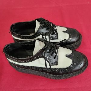 Women's size 7 black and white tuxedo T.U.K platforms